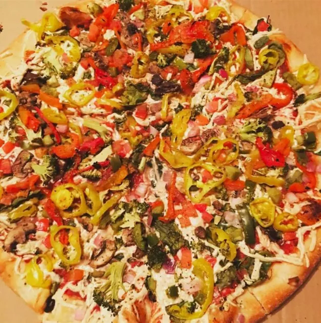 Hippie's Pizza 121 W. 13 Mile Rd., Royal Oak; 248-733-1111 Hippie's made its name on creative toppings like hemp seed and corn, and it didn't forget about vegans. Pizzas can be ordered with Daiya cheese and vegan sausage and pepperoni. As a bonus, there's also a vegan dessert menu with choices like Vegan Bam Bam Bread. (Photo courtesy of IG user @eatgreendetroit)