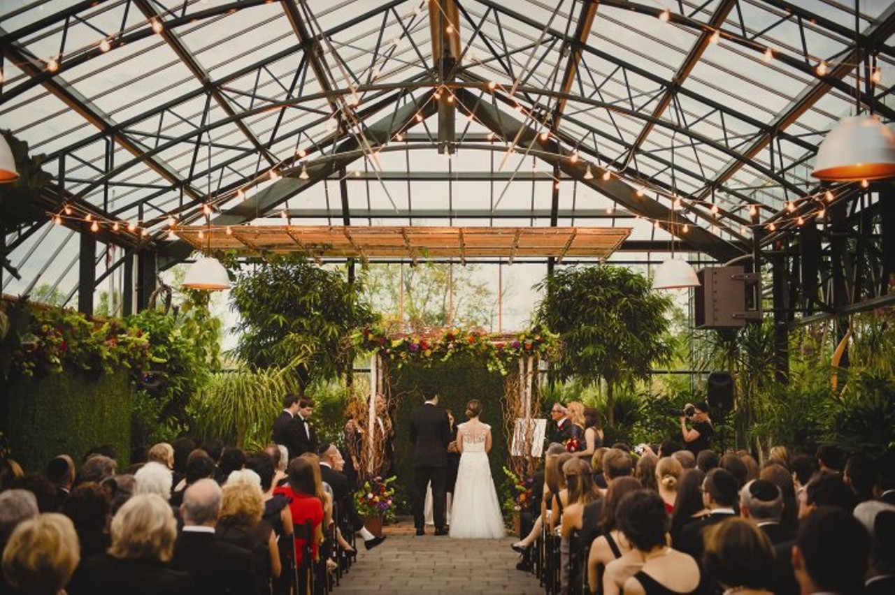 Planterra Conservatory: Tying the knot in one of Planterra's whimsical and lusciously grand greenhouses is an unforgettable experience. With the night sky as your ceiling and the stars as your chandelier, guests will be nothing but dazzled by your ceremony or reception. Located at 7315 Drake Rd, West Bloomfield Township. Photo via The Knot