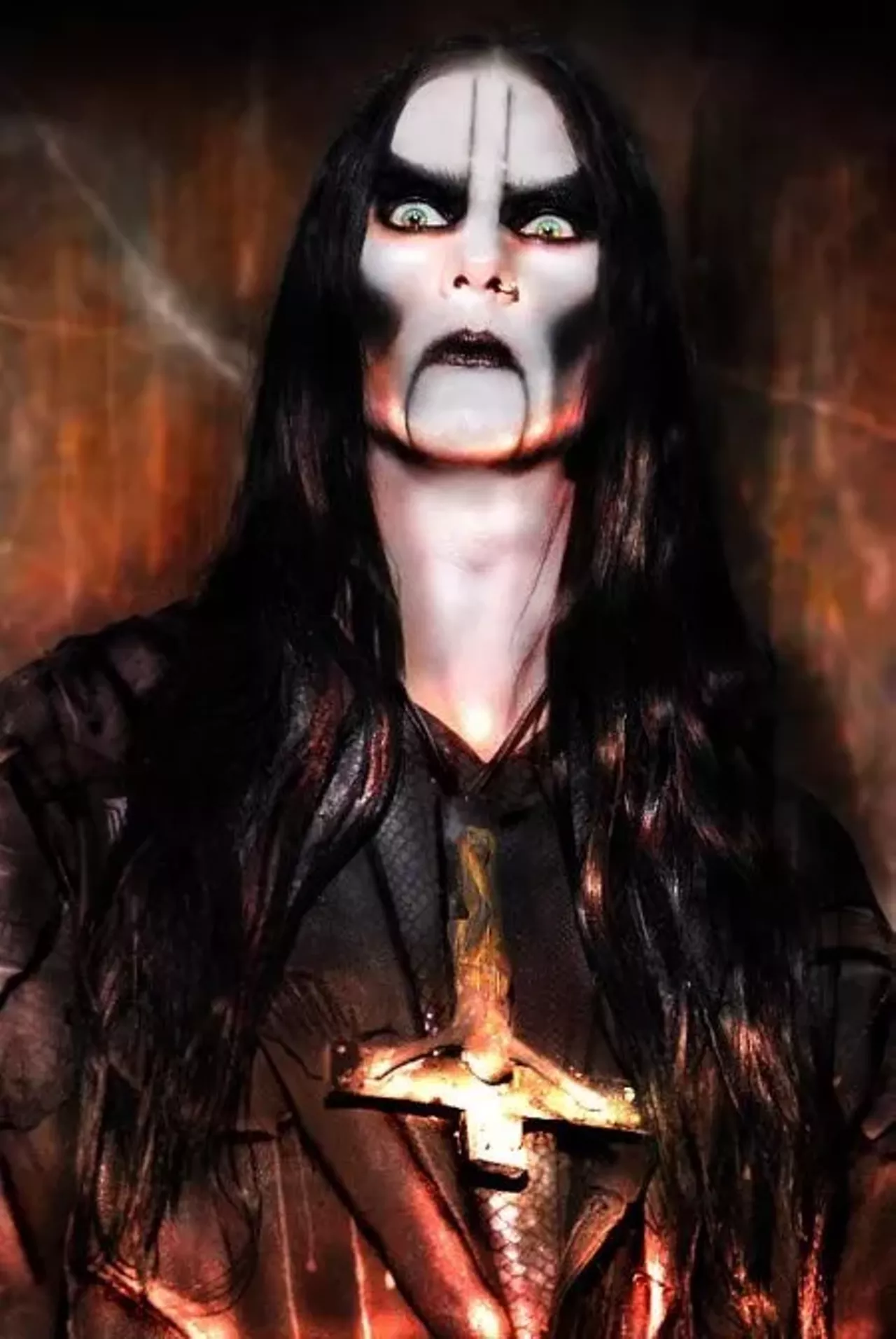 Mustis, formerly of Dimmu Borgir, takes a more elegant approach to his corpse paint. The makeup gently accentuates his well-defined cheekbones.