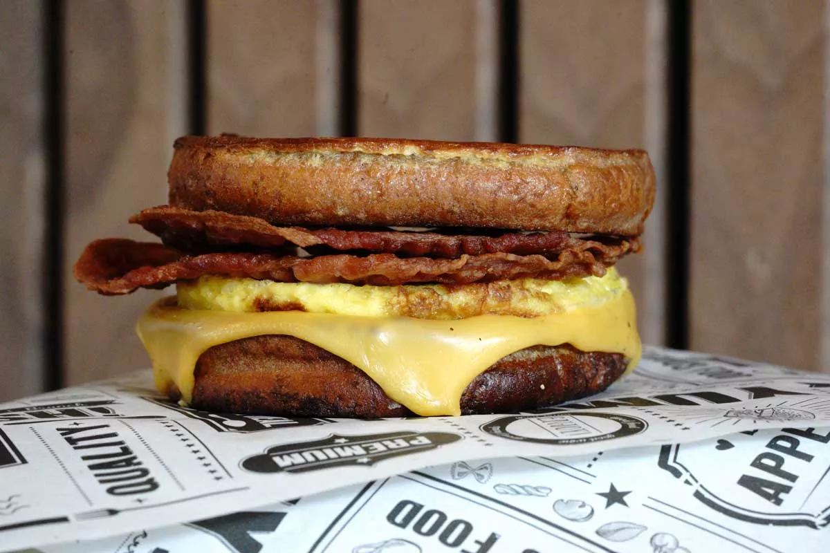 Image: The breakfast sandwiches at A.M. Buzz include bacon, egg, and cheese served on French toast.