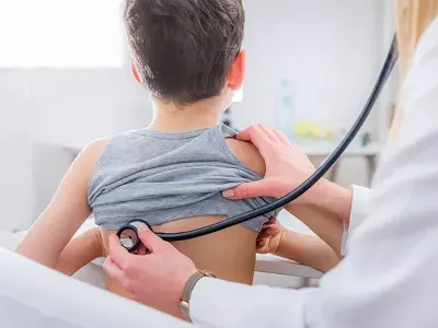 Child examined by doctor