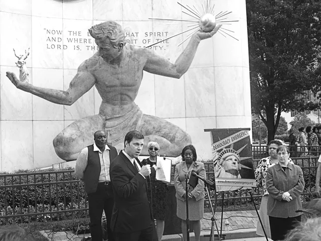 Attorney John Philo and other opponents of the emergency manager law make their case outside Detroit City Hall.