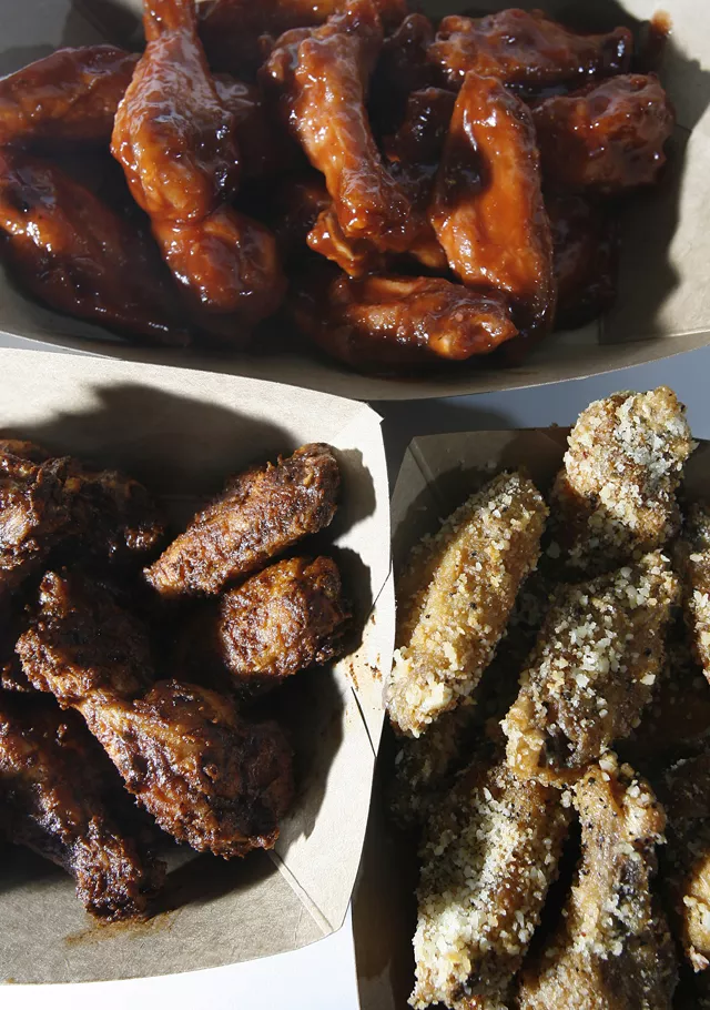 Barbecue, Parmesan-garlic and hot wings (clockwise from top) from Detroit's City Wings. - MT photo: Rob Widdis