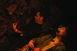 Bassist Mike Shellabarger (left) and country crooner Carrie Shepard (right) of the Whiskey Charmers. - CHRIS CUNNINGTON
