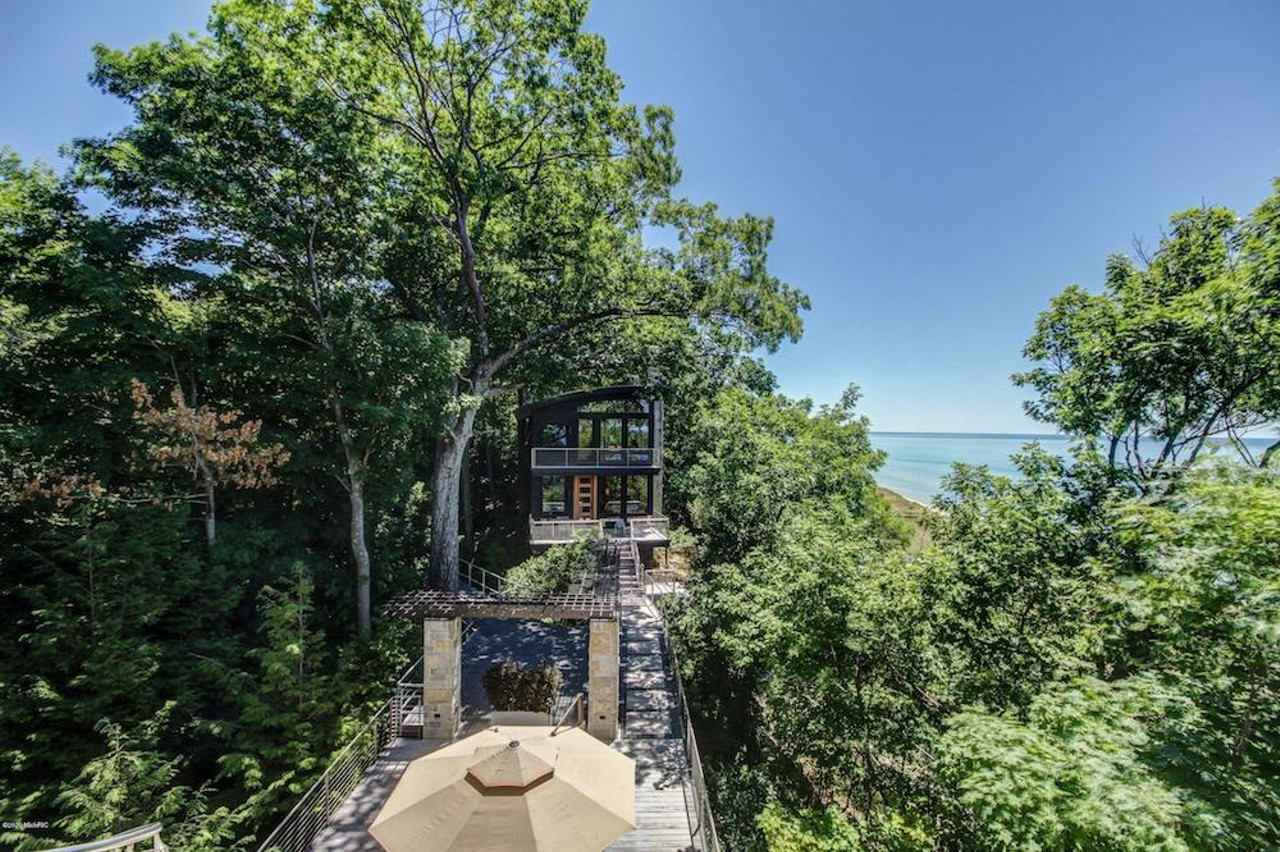 Behold this modern $6.3 million mammoth Montague mansion on a dune overlooking Lake Michigan