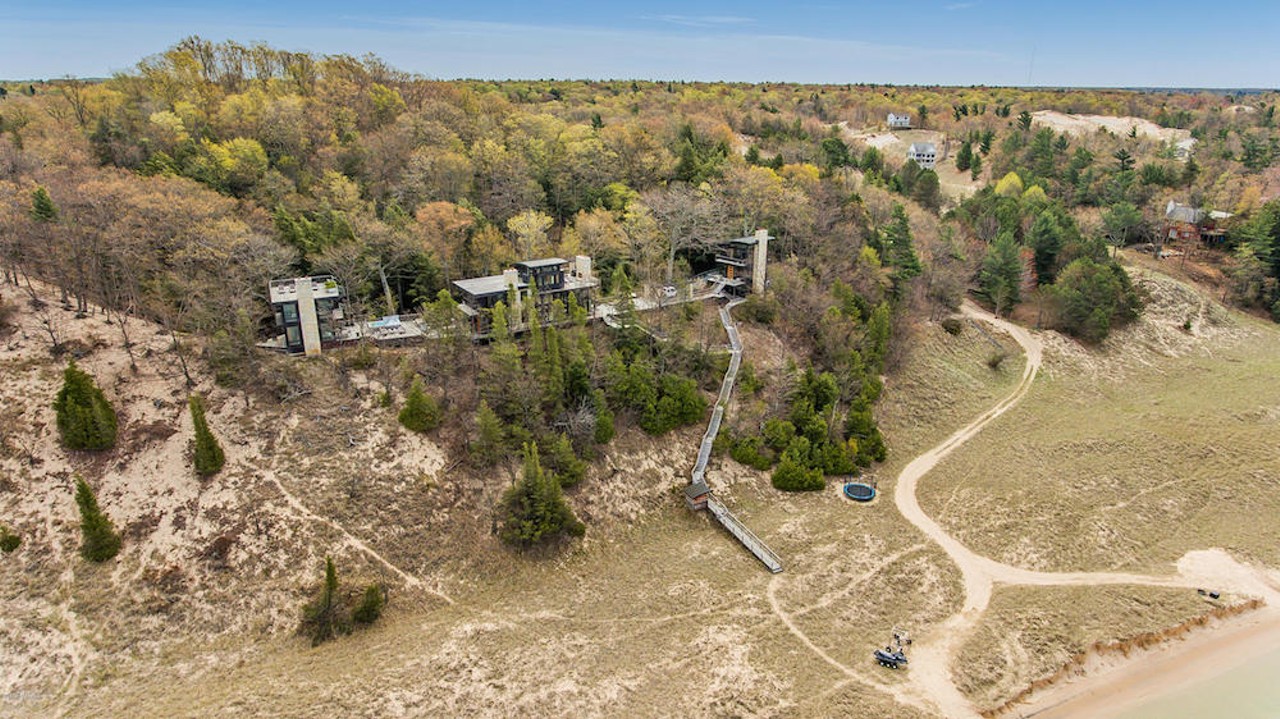Behold this modern $6.3 million mammoth Montague mansion on a dune overlooking Lake Michigan