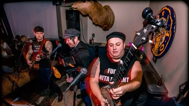 Mark Paul (at right), aka Captain Don River, with his bawdy band of salty seamen, Captains of the Head.