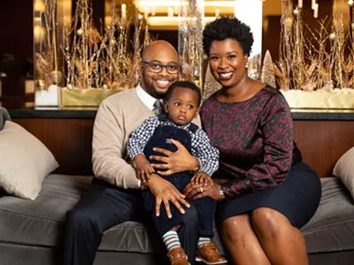 Victoria Burton-Harris with her husband, Robert Burton-Harris, and their son Langston.
