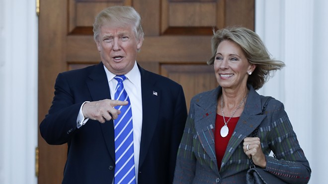 President Donald Trump and U.S. Education Secretary Betsy DeVos.
