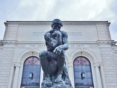 "The Thinker" sculpture by Auguste Rodin ponders outside the Detroit Institute of Arts.