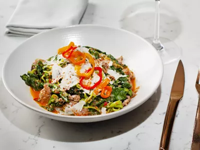 Tagliolini with Calabrian sausage, rapini, pecorino, Fisheye Farms spinach, and pickled pepper.