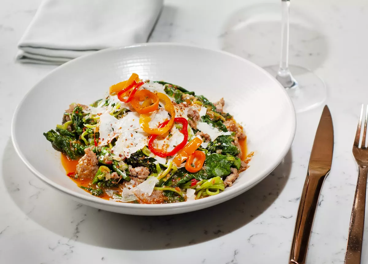 Tagliolini with Calabrian sausage, rapini, pecorino, Fisheye Farms spinach, and pickled pepper.