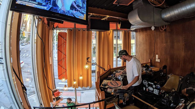 A DJ spins during a past edition of Urban Bean Co.'s "Planet Funk" show.