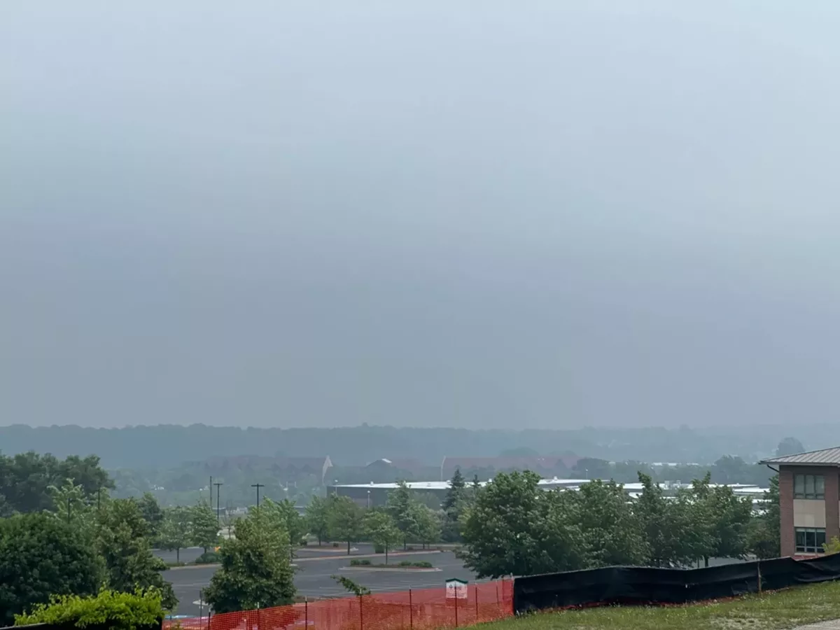 Image: A smoky haze settles over Traverse City, as seen from the top of Copper Ridge Drive in June 2023.