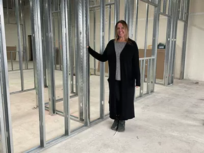 Canine to Five owner Liz Blondy at the construction site for her newest location in Jefferson Chalmers.