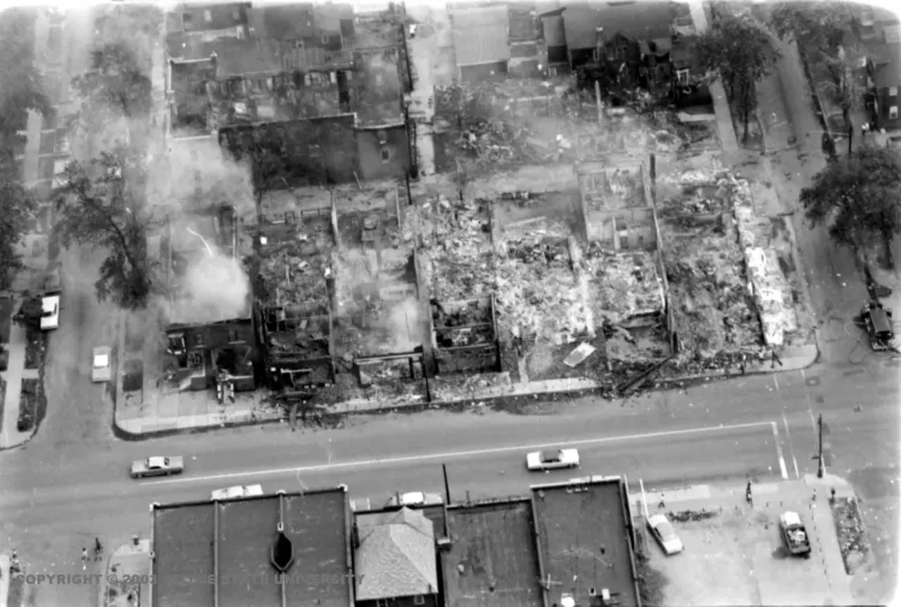 Fire destroyed entire neighborhoods in the predominantly black area where the rioting began, leaving wounds from which some communities never recovered. An aerial view of Linwood at 12th Street shows the scope of the damage to one city block. 