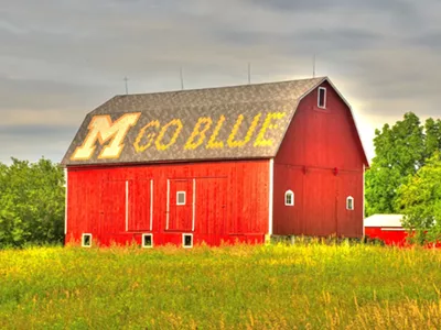 A barn with "M Go Blue" on the roof.