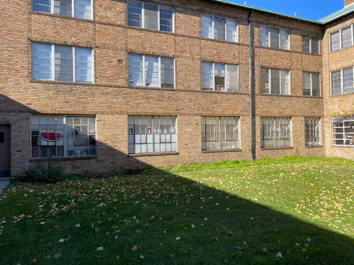Image: Cranbrook students put graphics of watermelons, which are used to show solidarity with Palestine, in their windows after Palestinian flags were removed by the academy.