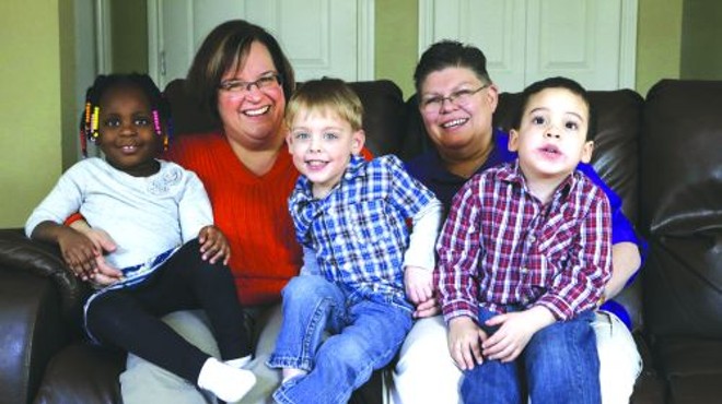 April DeBoer and Jayne Rowse, who are challenging Michigan’s ban on same-sex adoption, with their three ‘foster’ children.
