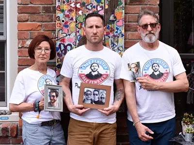 Journalist Danny Fenster’s family, from left: Buddy, Bryan, and Rose, at their Huntington Woods home.