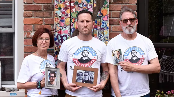 Journalist Danny Fenster’s family, from left: Buddy, Bryan, and Rose, at their Huntington Woods home.