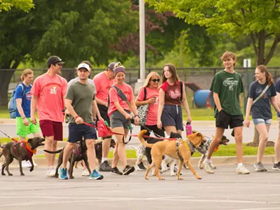 People and their four-legged friends walking at the Mutt Strut.