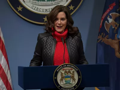 Gov. Gretchen Whitmer announces details of a tax relief plan alongside Senate Majority Leader Winnie Brinks and House Speaker Joe Tate during a press conference on Feb. 6, 2023.