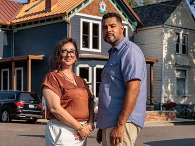 Tanya Saldivar-Ali and Luis Ali stand outside the Design Build Green Tech Hub, a community project they led, during its grand opening on September 14, 2024.