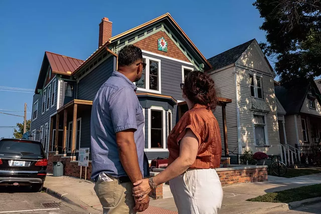 Tanya Saldivar-Ali and Luis Ali stand outside the Design Build Green Tech Hub, a community project they led, during its grand opening on September 14, 2024.