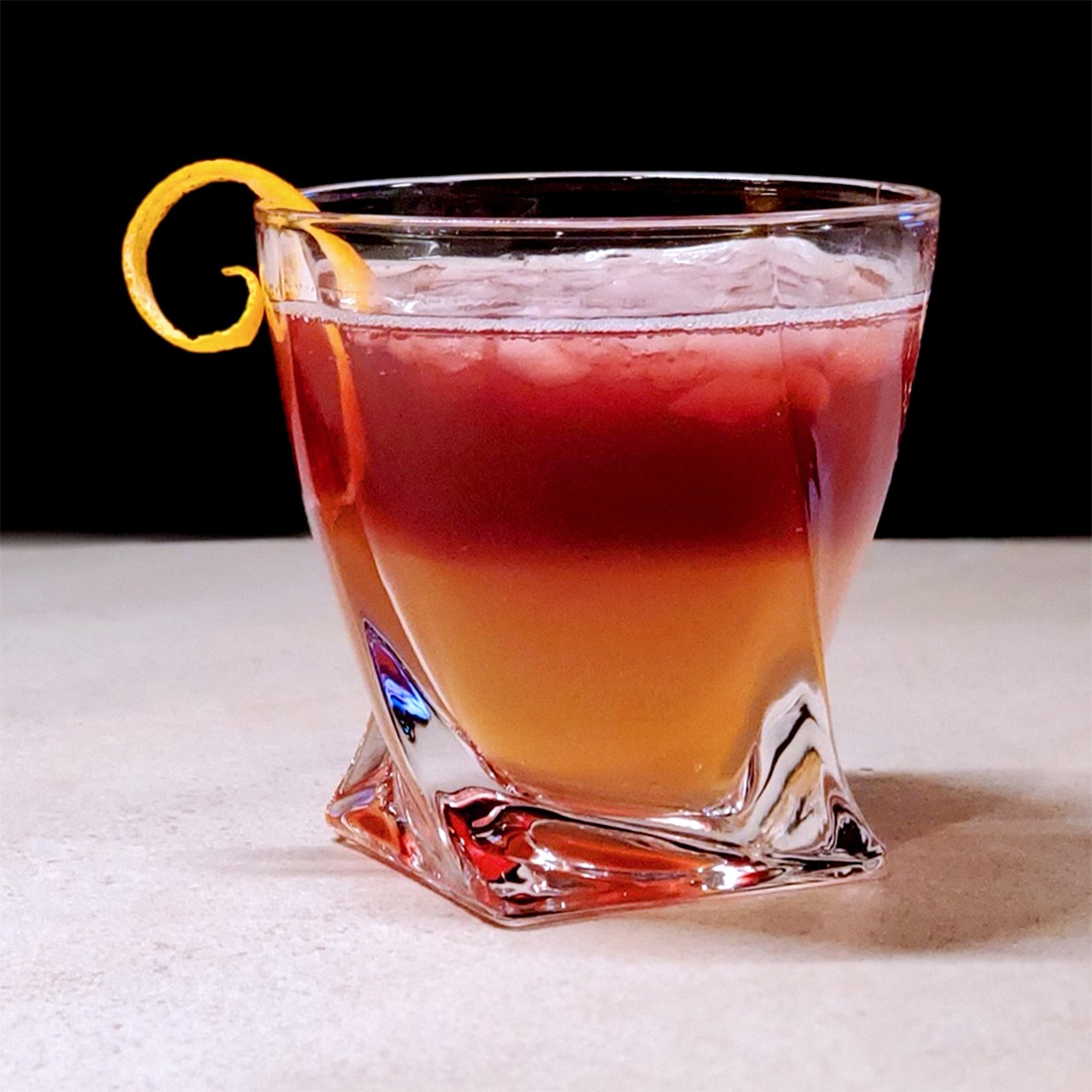 Team Muzzarelli's Jack Daniel's Rye "Eastside Sour"
Ingredients:
- 2 oz Jack Daniel's Rye 
- 2.5 oz Sour mix*
- 2-3 dash orange bitters
- Shake and pour over ice
- Layer over .5 oz of your favorite sangria and garnish with expressed orange peel 
*Sour mix: Equal parts simple syrup & lemon juice