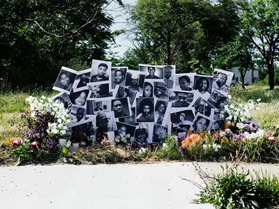 Lisa Waud's latest floral installation, located at the intersection where Malice Green was killed by Detroit Police in 1992, honors other Black people who were slain. The installation is up until the end of the day on Saturday.