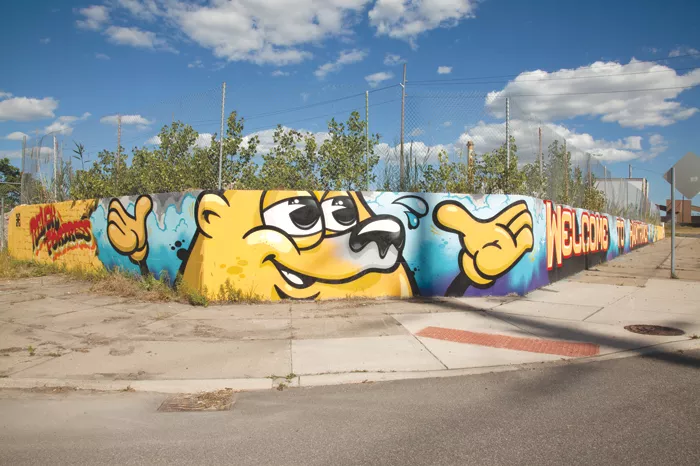 Detroit Beautification 5: Revok and Flying Fortress created this welcome sign at one of the entrances to Hamtramck. - Photo by Julie Pincus.