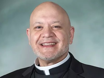 Detroit-based Father Carlos Martins is accused of flossing with a girl’s hair.