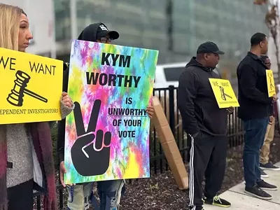 Protesters demand that Wayne County Prosecutor Kym Worthy investigate cases handled by disgraced former Detroit Detective Barbara Simon.
