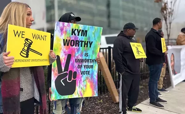 Protesters demand that Wayne County Prosecutor Kym Worthy investigate cases handled by disgraced former Detroit Detective Barbara Simon.