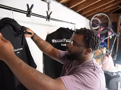 Quandell Wright in his Dearborn garage/fashion studio.