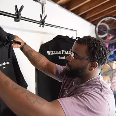 Quandell Wright in his Dearborn garage/fashion studio.