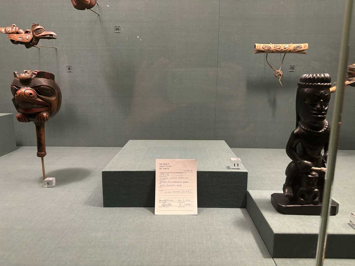 An item described as a “model of a Shaman’s guardian figure” from the Central Council of Tlingit & Haida Indian Tribes of Alaska had been removed from a display case at the DIA. A placard in its place notes “this item has been temporarily removed” and is dated August 1, 2022.