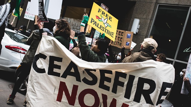 Protesters call for a ceasefire at Sen. Debbie Stabenow’s Detroit office.