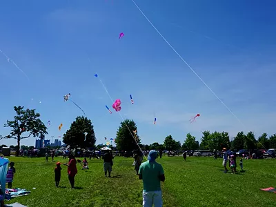 Kites flying over Detroit's Belle Isle.