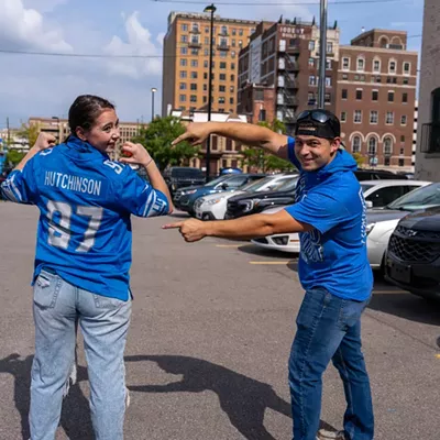Image: Detroit Lions fans show team spirit at first home game of the season