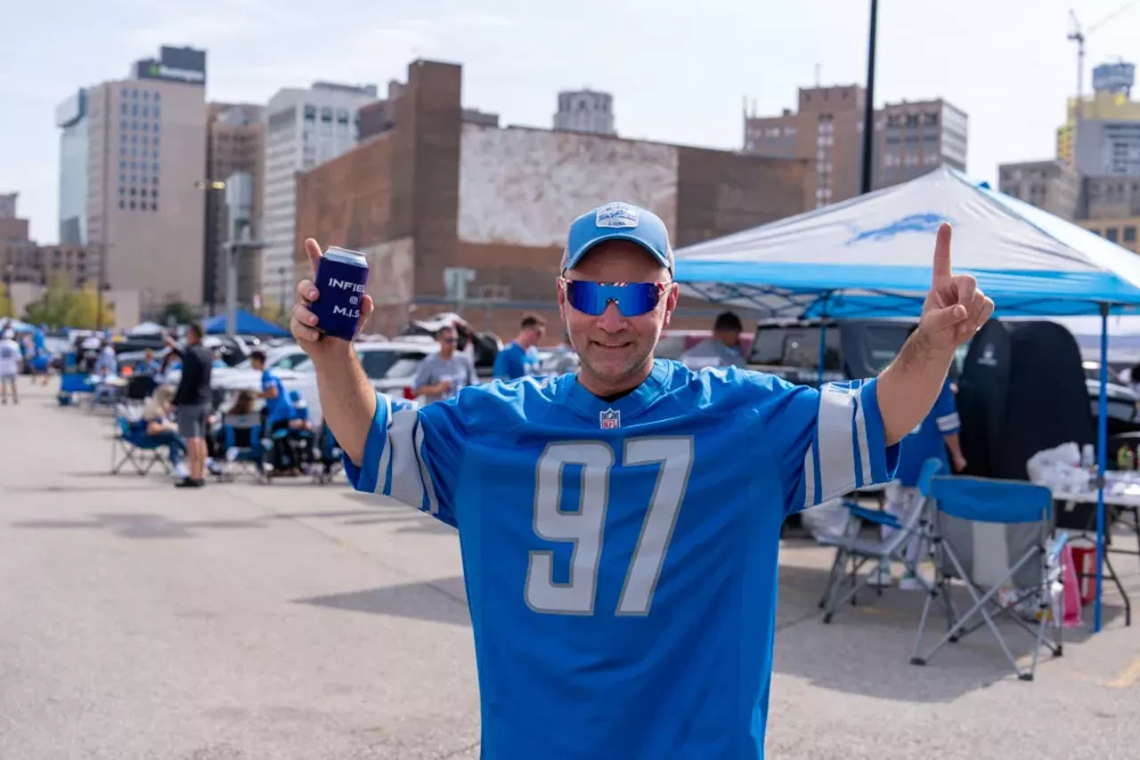 Image: Detroit Lions fans show team spirit at first home game of the season