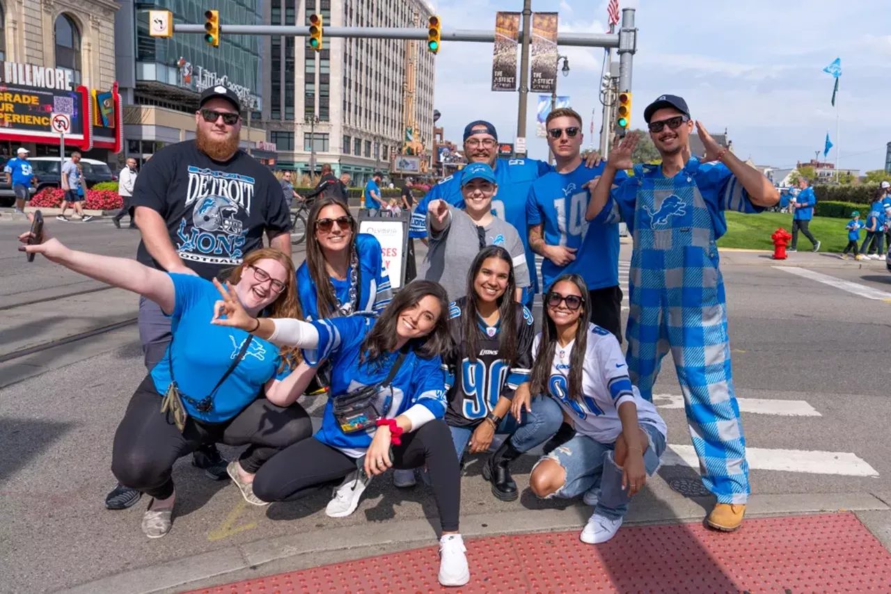 Image: Detroit Lions fans show team spirit at first home game of the season