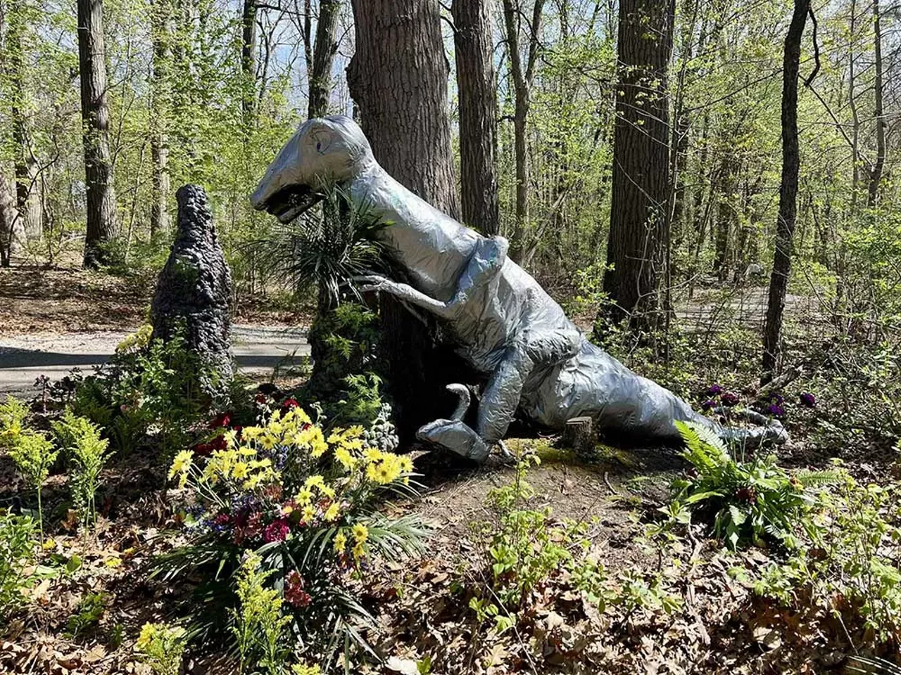 At the beginning of the loop, Blossoms of Royal Oak’s “Graff the Graffiti Dino” – a large dinosaur made of silver duct tape — stood among flowers and invited visitors to leave their mark.