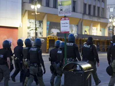 Image: Detroit police accused of 'severely' beating a legal observer, pepper-spraying 2 others at protest