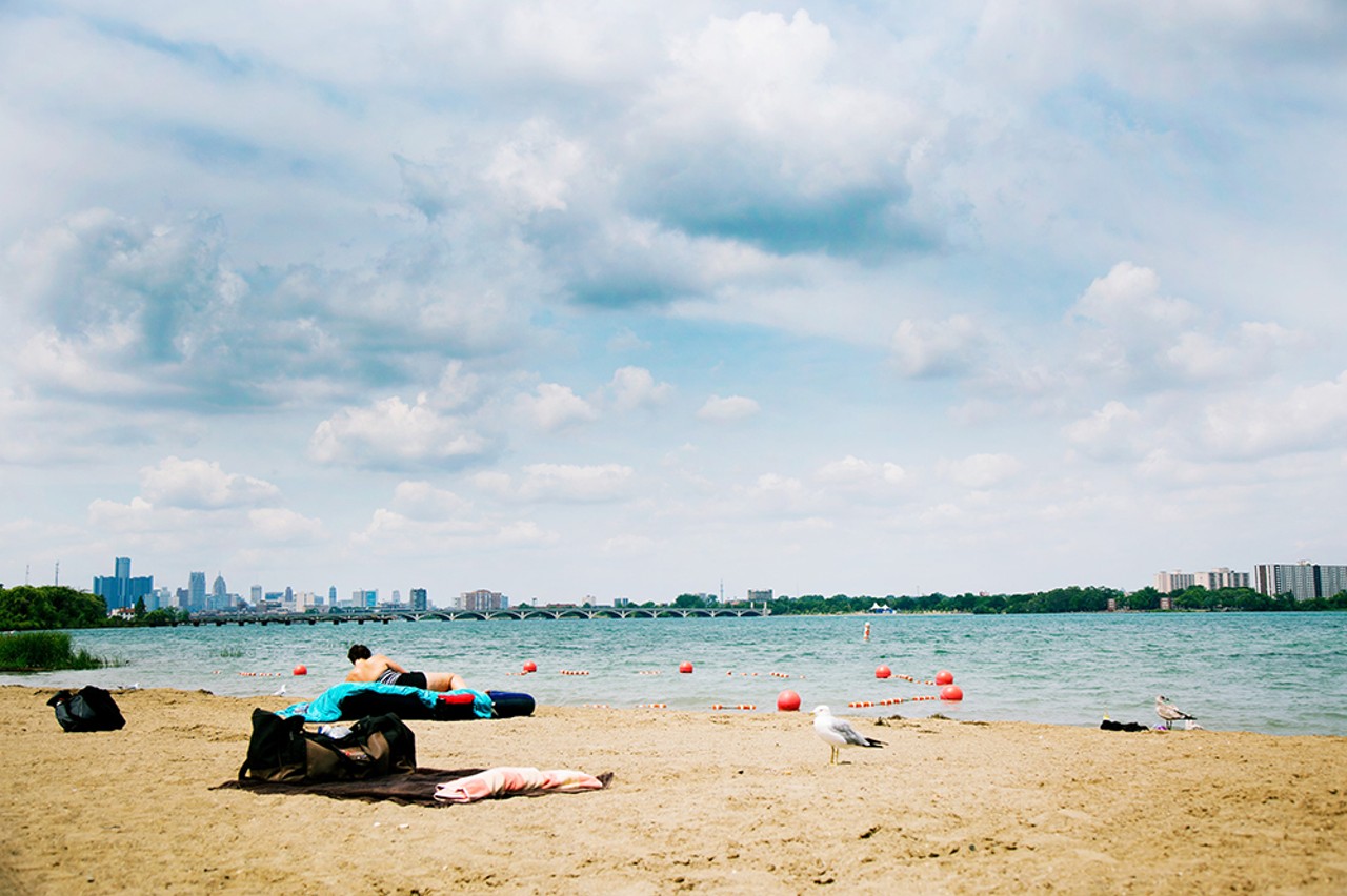 Thou shalt swim at Belle Isle.
As soon as the weather heats up, Belle Isle’s beaches are packed, whether people are actually swimming, having a barbecue on the beach, or just soaking up the sun. Many people do swim in the Detroit River at Belle Isle, but many others think it’s gross and never do. Either way, Belle Isle is a big part of summer in Detroit. 