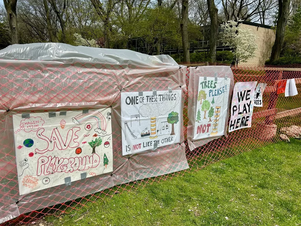 Image: Children drew colorful signs in protest of the steam project near their playground.