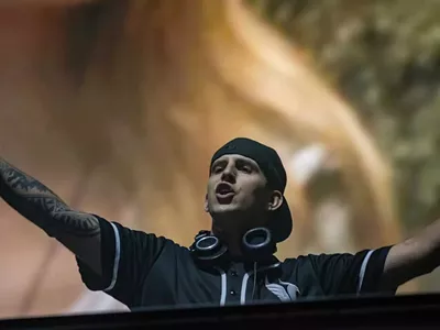 Denver’s Illenium performs at the Detroit Grand Prix on Saturday.