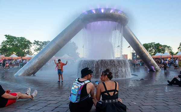 Movement Music Festival fans enjoy the newly renovated Dodge and Son Memorial Fountain.