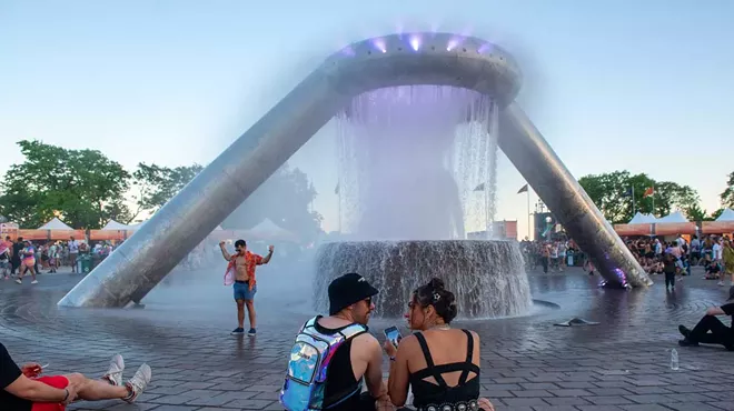 Movement Music Festival fans enjoy the newly renovated Dodge and Son Memorial Fountain.